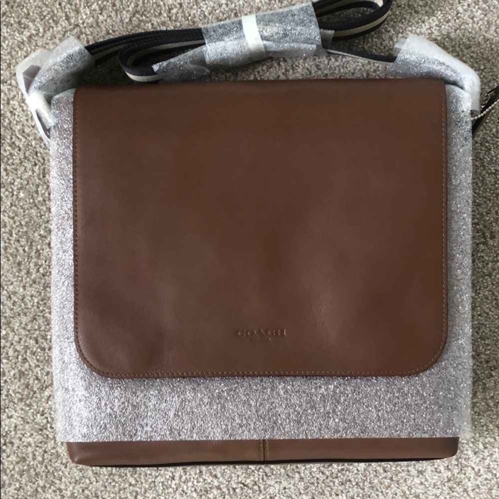 NWT Coach men’s messenger bag in Saddle